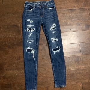 american eagle dark wash jeans skinny/patched rips